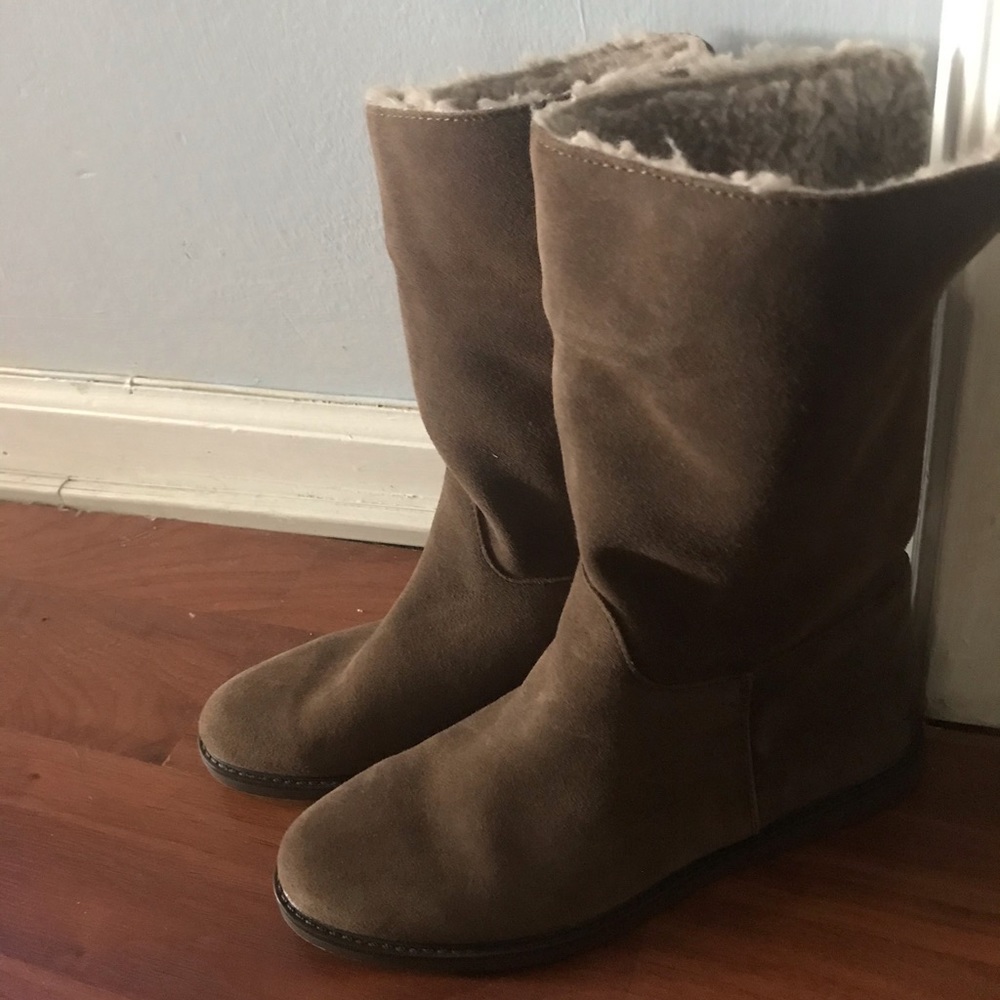 Warm suede pull in Boots.